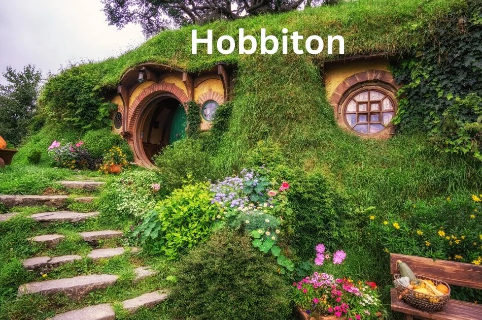 hobbiton-movie-set-with-hobbit-holes-and-green-hills-in-new-zealand