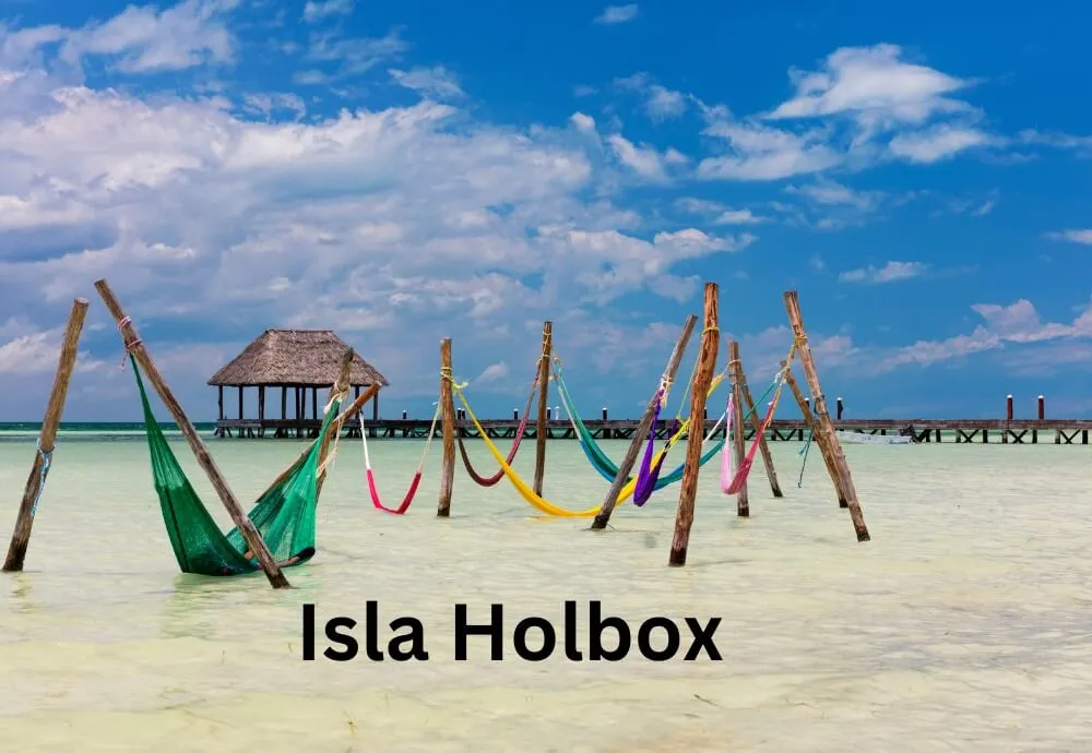 best-places-to-visit-in-Mexico-isla-holbox-hammocks-in-shallow-water-with-wooden-pier-in-mexico