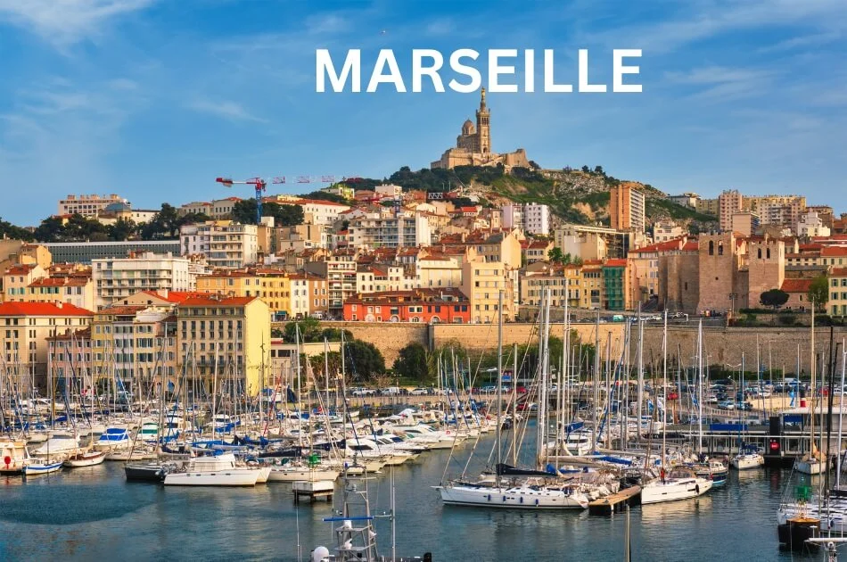 old-port-with-boats-and-notre-dame-de-la-garde-in-marseille-france