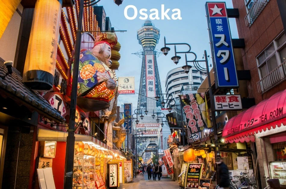 Vibrant-Dotonbori-street-in-Osaka-Japan-neon-lights-restaurants-shops-and-the-iconic-Tsutenkaku-Tower-in-the-background.